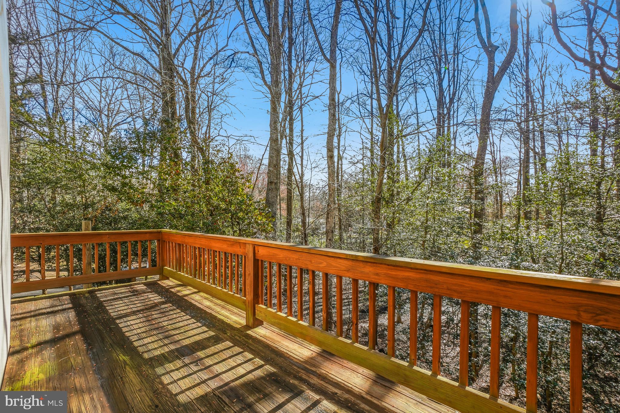 2315 Glade Bank Way Reston, VA 20191 - Photo 17 of 52 a view of a balcony with wooden floor