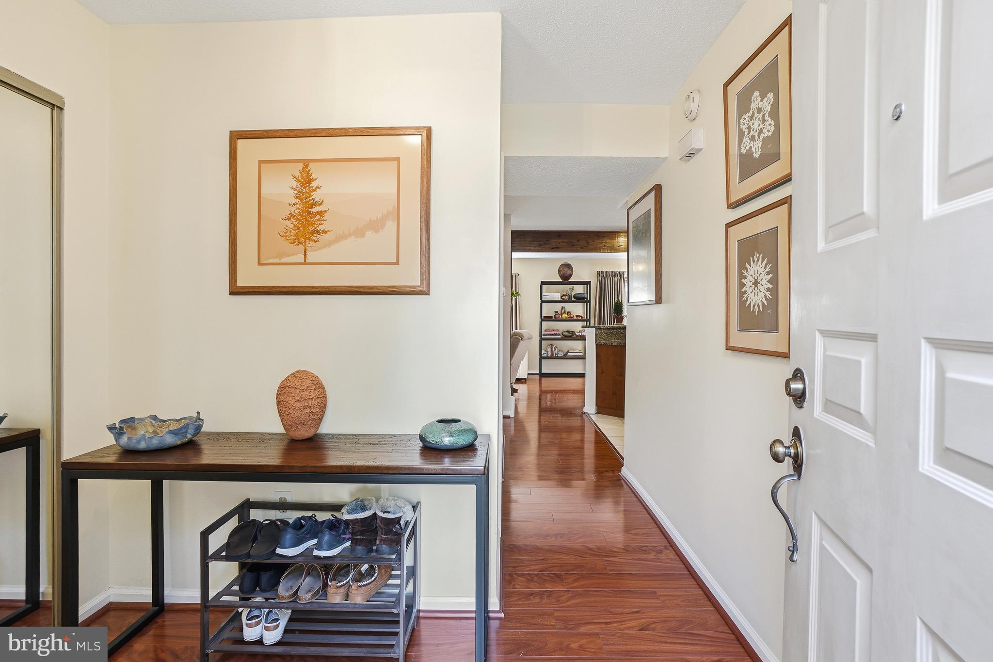 2315 Glade Bank Way Reston, VA 20191 - Photo 2 of 52 a view of livingroom with furniture and wooden floor