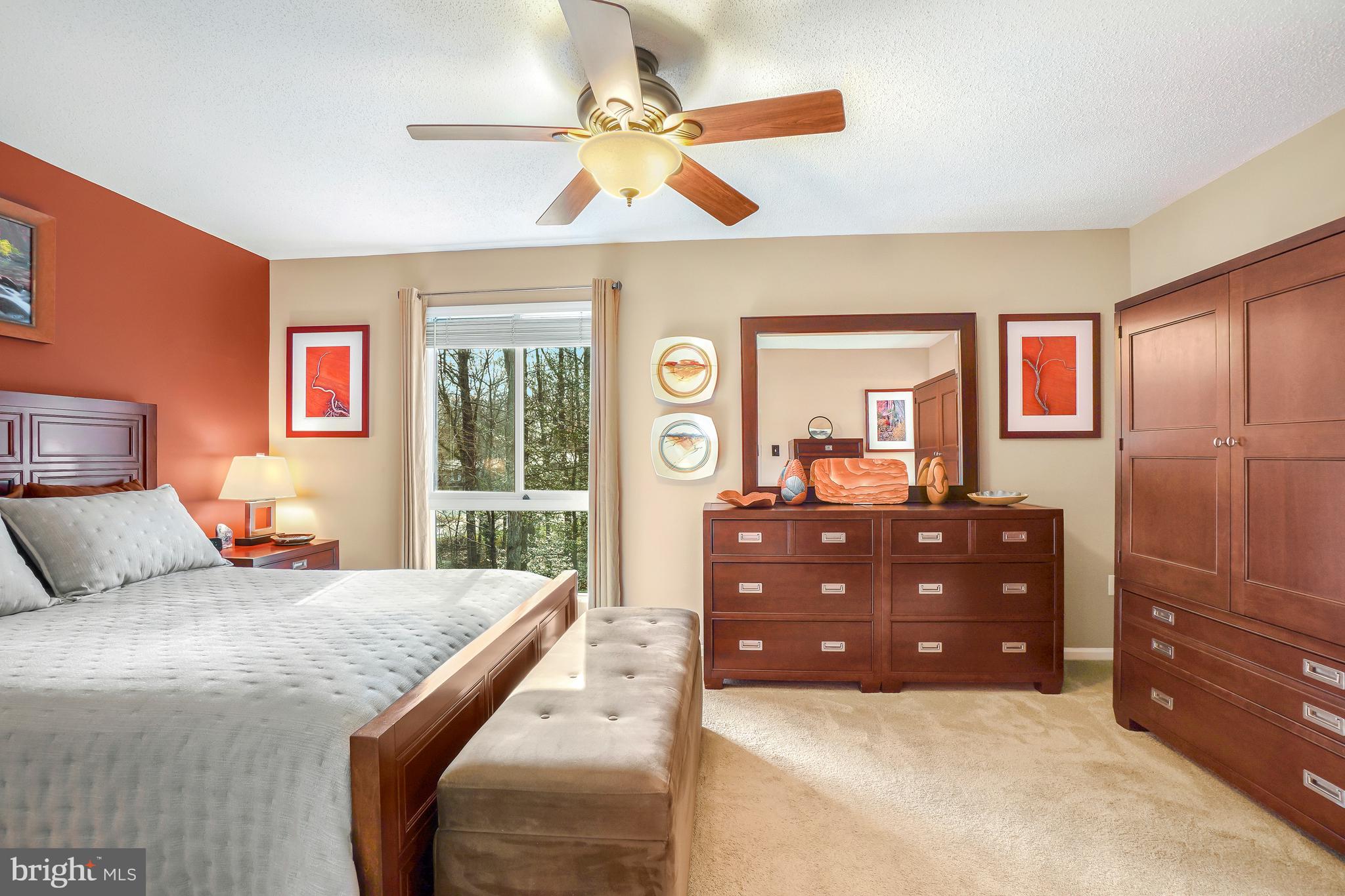 2315 Glade Bank Way Reston, VA 20191 - Photo 22 of 52 a bedroom with a bed and wooden floor