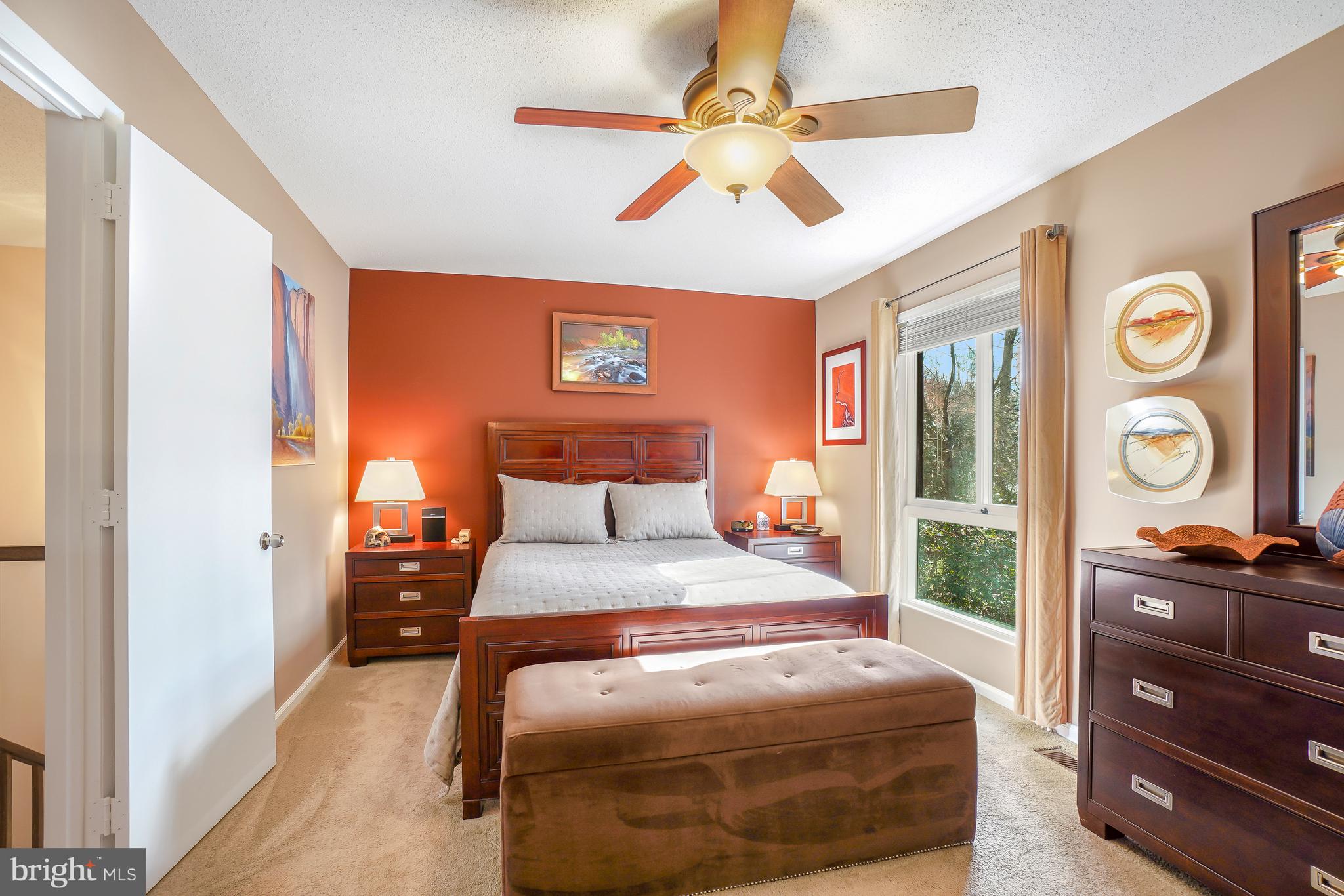 2315 Glade Bank Way Reston, VA 20191 - Photo 23 of 52 a bedroom with a bed and a chandelier