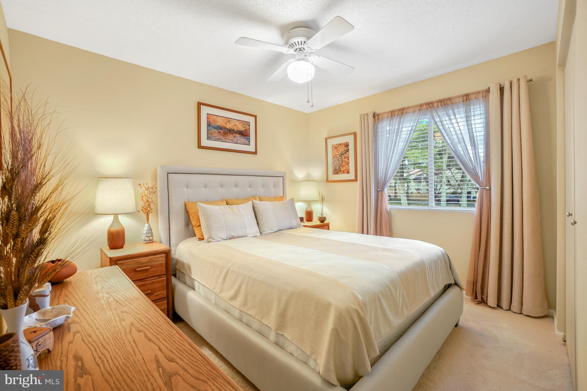 2315 Glade Bank Way Reston, VA 20191 - Photo 31 of 52 a bedroom with a large bed and a window