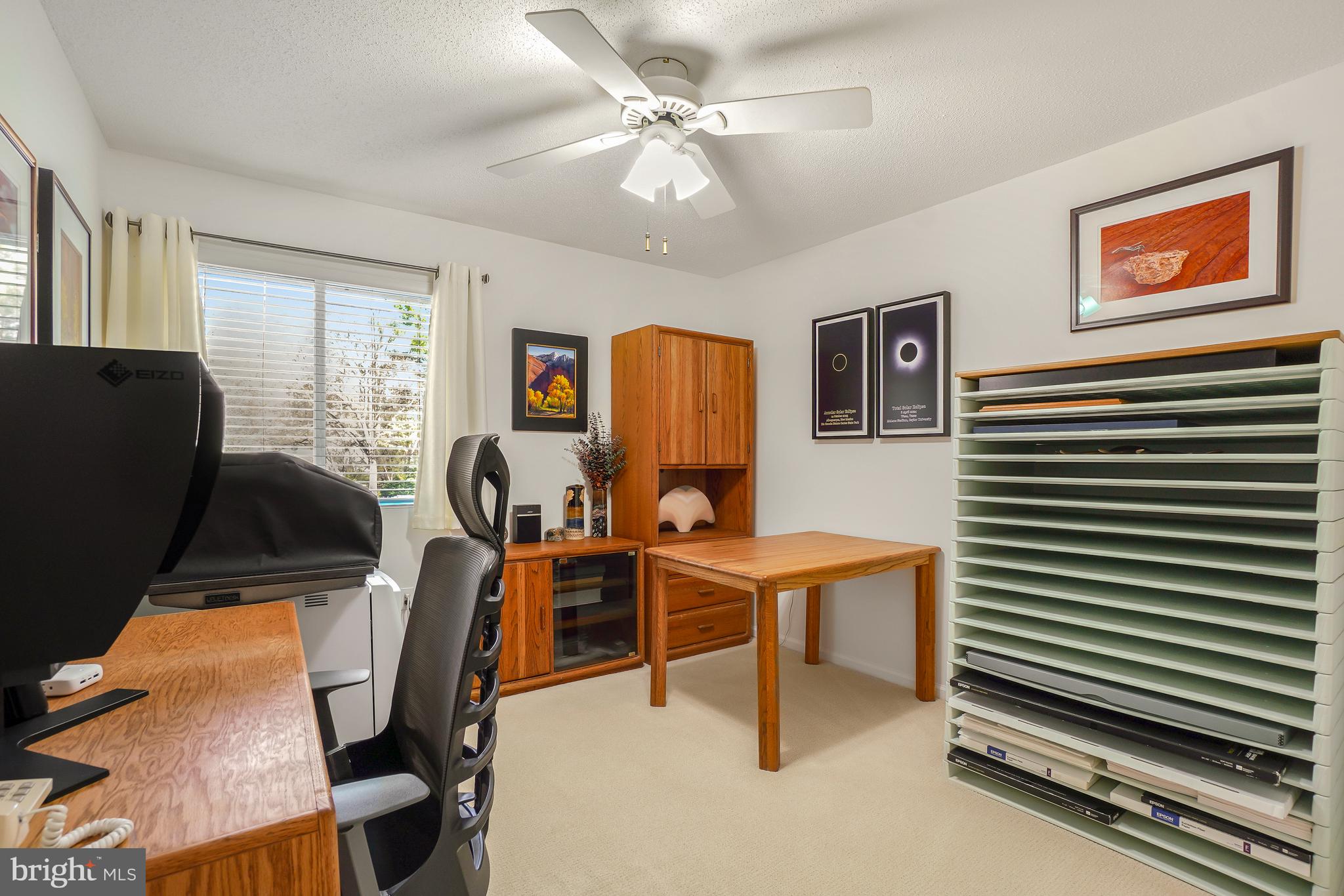 2315 Glade Bank Way Reston, VA 20191 - Photo 34 of 52 a view of a workspace with furniture and a window