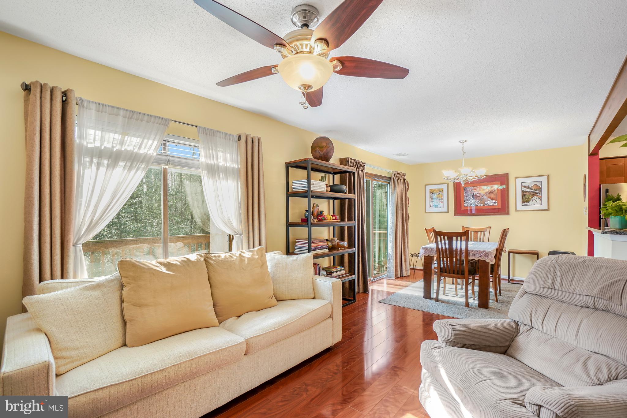 2315 Glade Bank Way Reston, VA 20191 - Photo 4 of 52 a living room with furniture and a large window