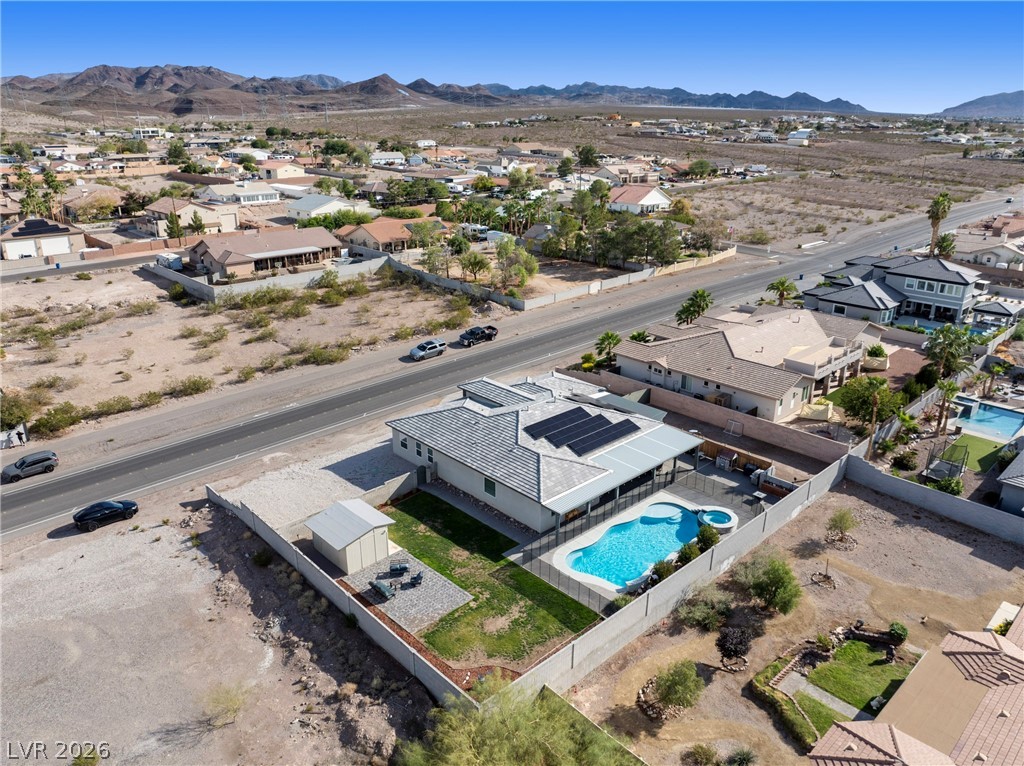 432 North Racetrack Road Henderson, NV 89015 - Photo 27 of 45 Aerial perspective of suburban area with a mountainous background and a pool area