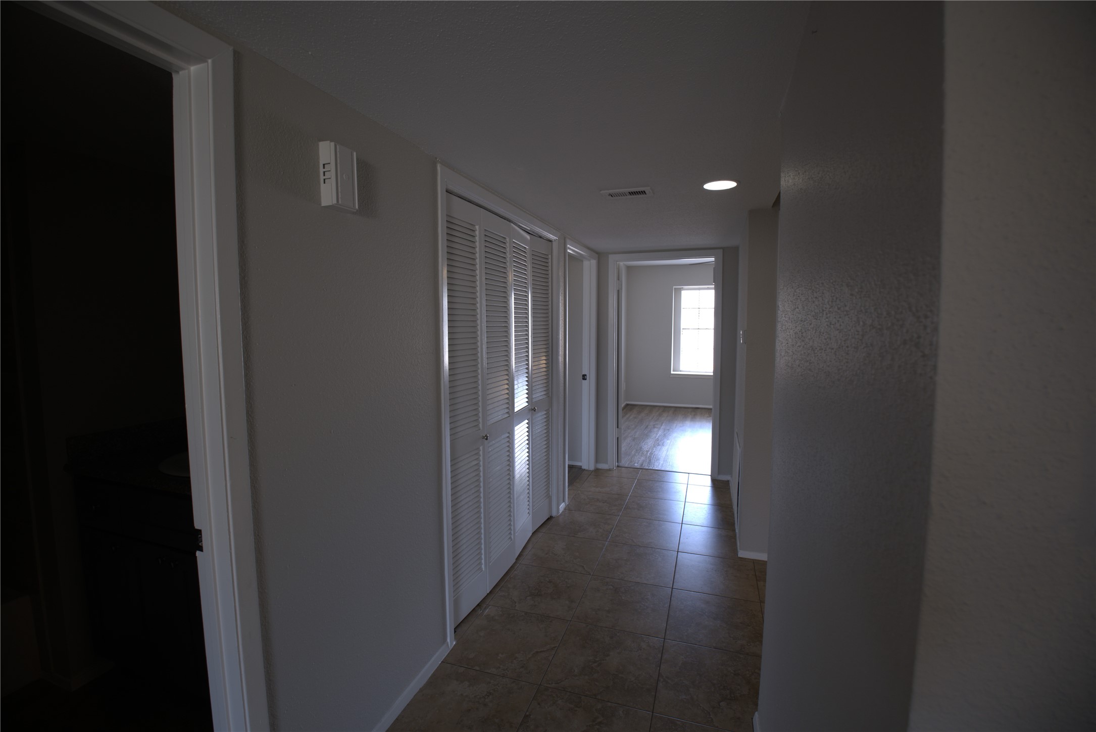 4444 Victory Drive, Unit 1208 Houston, TX 77088 - Photo 16 of 17 Ample hall, with washer and dryer close to the bedrooms.
