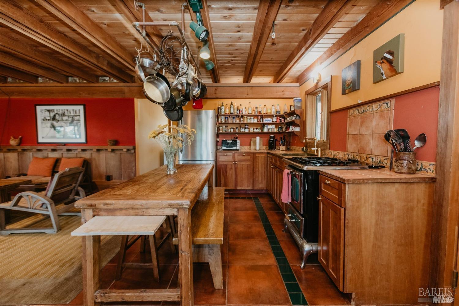 49100 Wickersham Road Geyserville, CA 95441 - Photo 24 of 98 a dinning table and chairs in a room