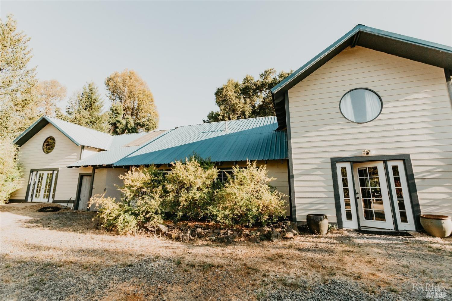 49100 Wickersham Road Geyserville, CA 95441 - Photo 46 of 98 a view of a house with a yard