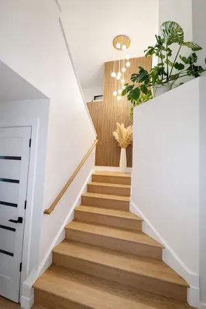 a white bath tub sitting in a bathroom next to a bathtub