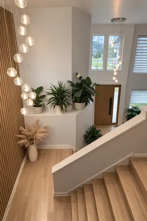 a bathroom with a toilet and shower curtain