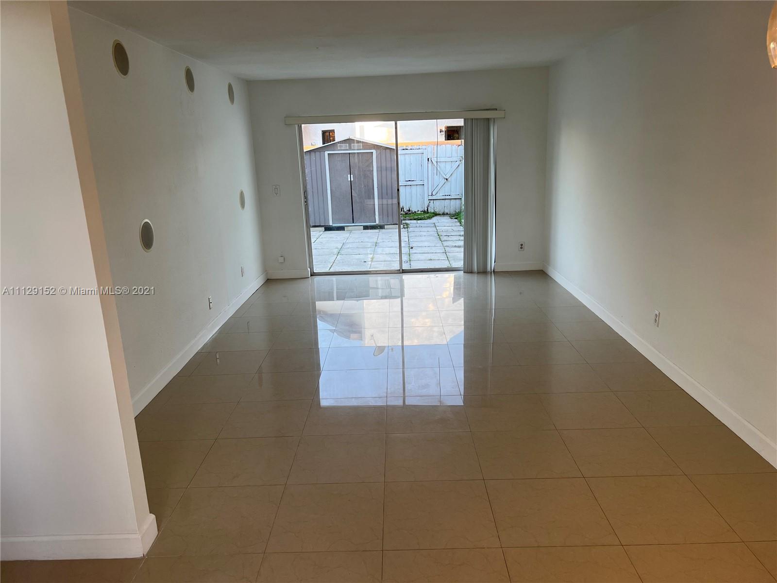 7009 Southwest 109th Place Miami, FL 33173 - Photo 2 of 7 view of an entryway