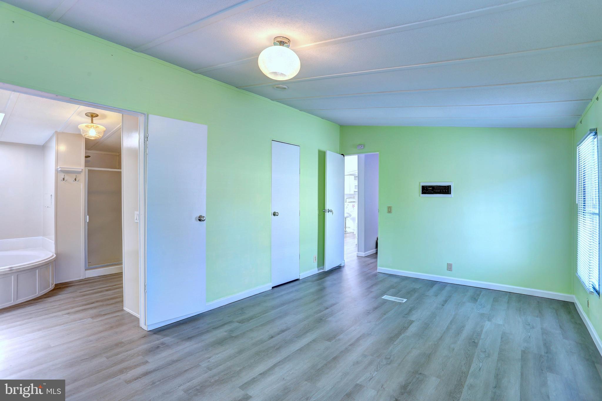 8353 Ashwood Road, Unit 8353 Jessup, MD 20794 - Photo 17 of 43 Primary Bedroom