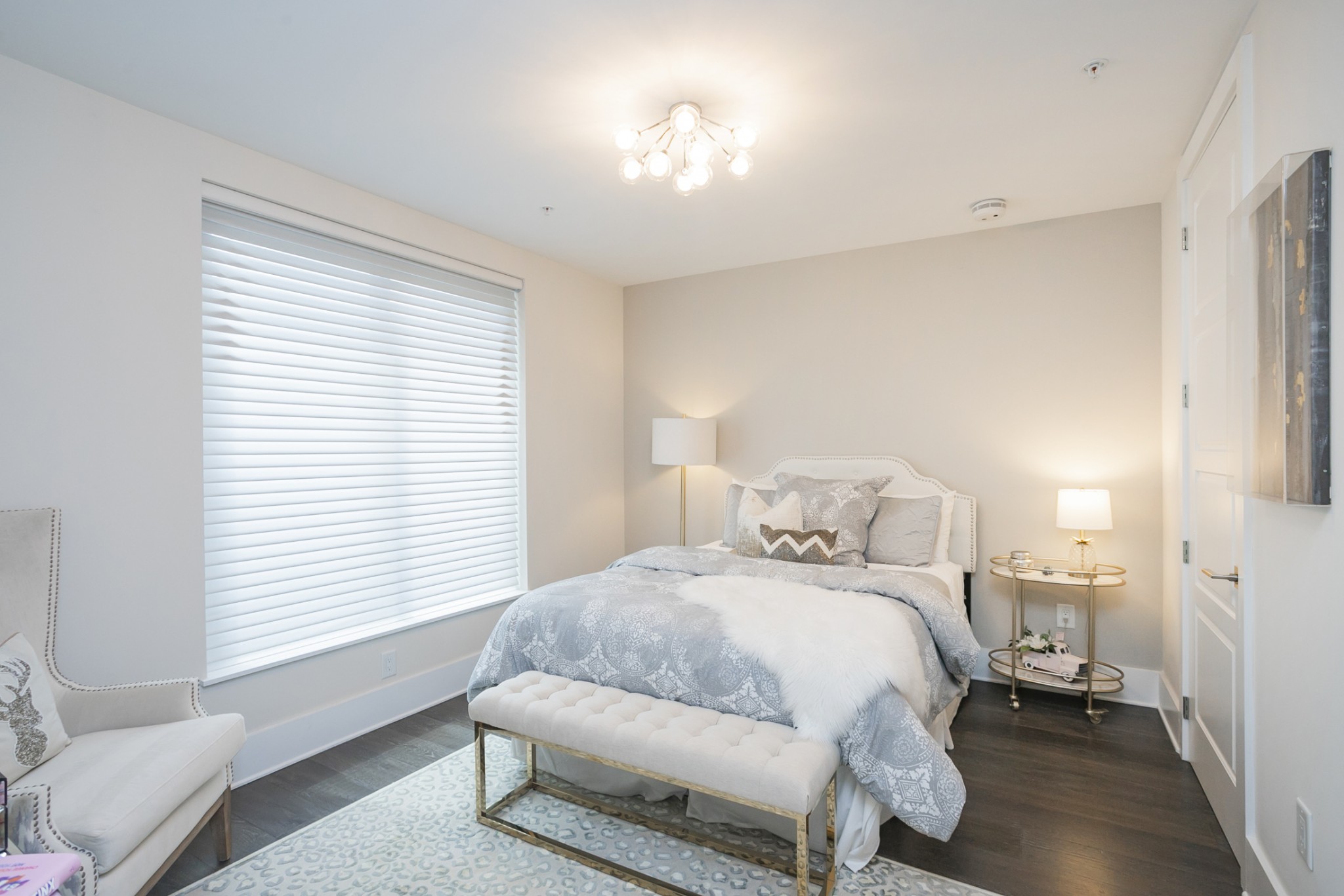 20 Rutledge Street, Unit 104 Nashville, TN 37210 - Photo 15 of 35 a bedroom with a bed and a window