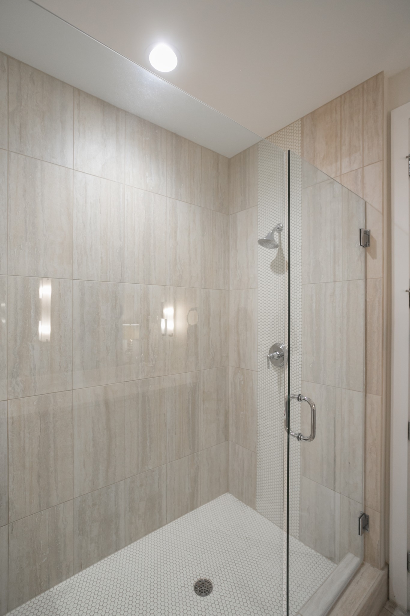 20 Rutledge Street, Unit 104 Nashville, TN 37210 - Photo 23 of 35 a bathroom with a shower and a sink