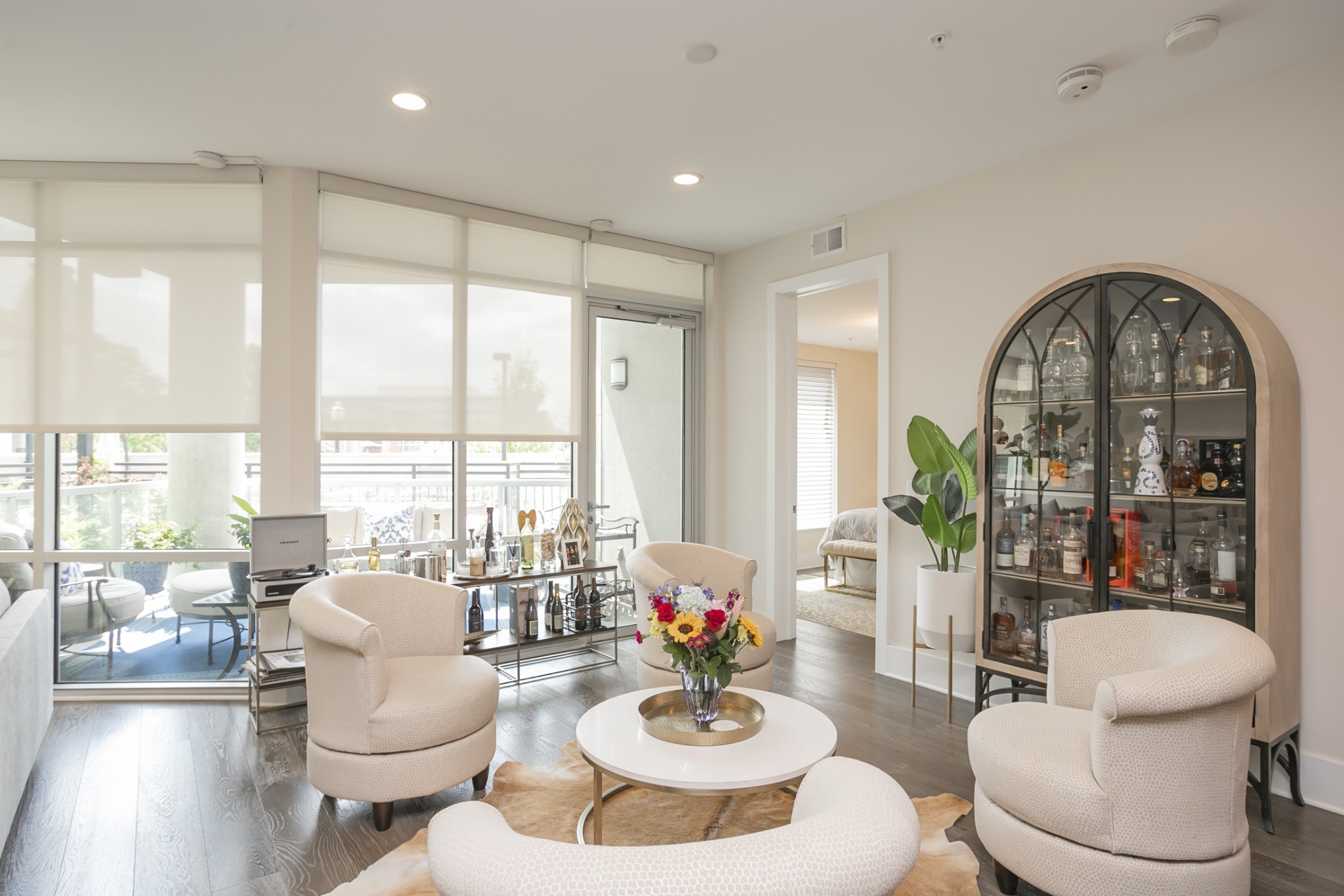 20 Rutledge Street, Unit 104 Nashville, TN 37210 - Photo 28 of 35 a living room with furniture and a large window