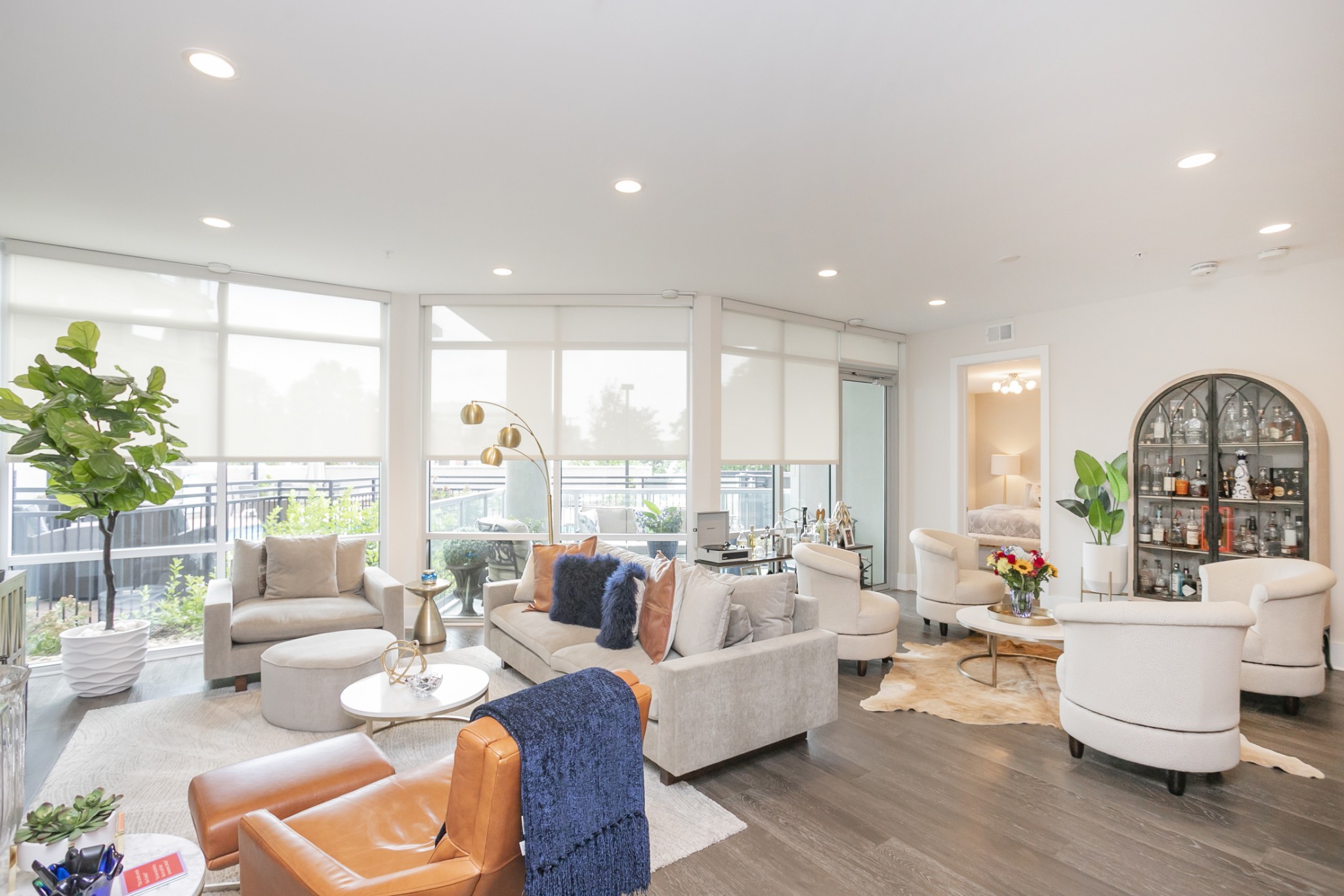 20 Rutledge Street, Unit 104 Nashville, TN 37210 - Photo 9 of 35 a living room with furniture and a large window