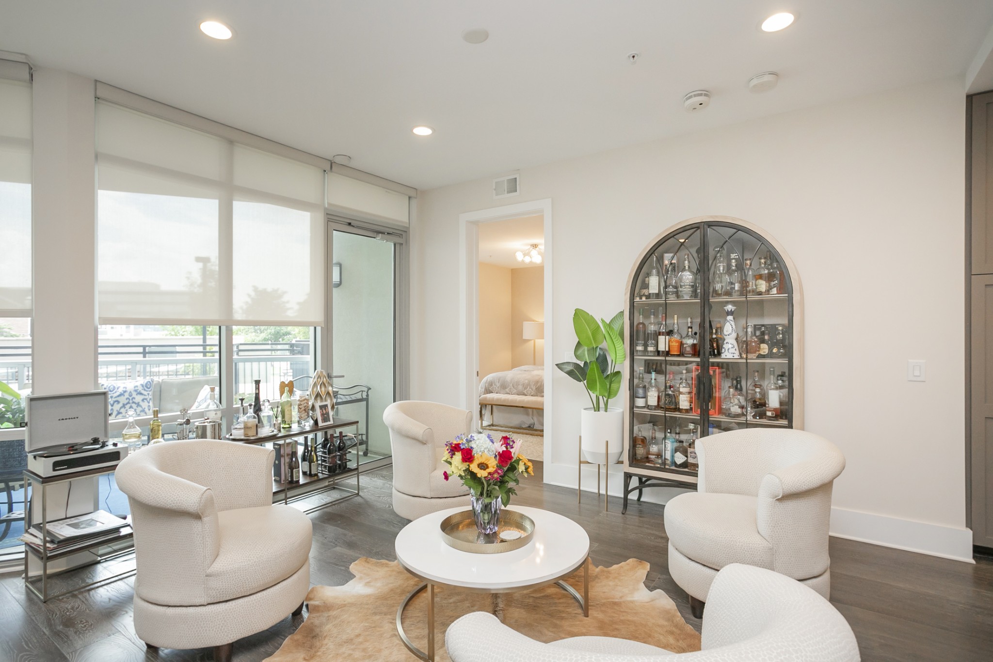 20 Rutledge Street, Unit 104 Nashville, TN 37210 - Photo 10 of 35 a living room with furniture and a large window