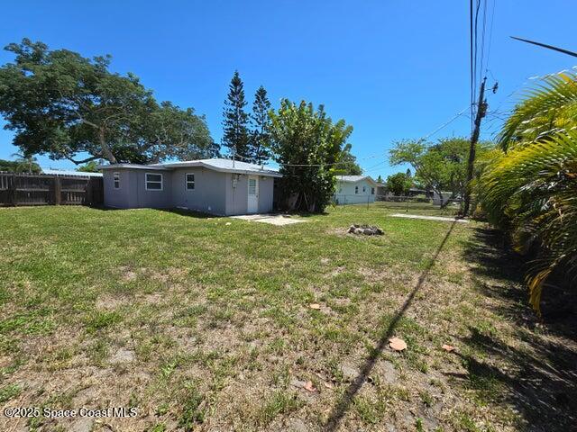2417 Delaware Drive Melbourne, FL 32935 - Photo 16 of 16 a backyard of a house