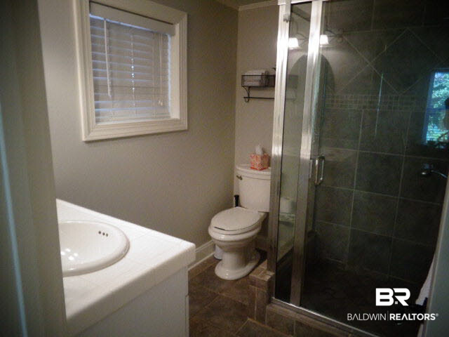 6674 Cook Road Foley, AL 36535 - Photo 29 of 45 Tiled floor. Walk-in shower with custom tile.