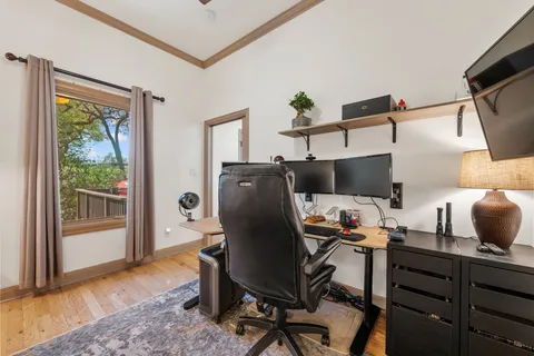 a workspace with furniture and a window