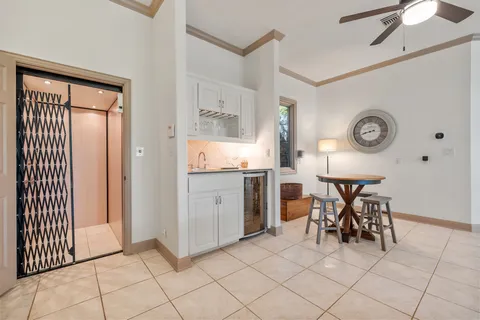 a view of kitchen with furniture and window