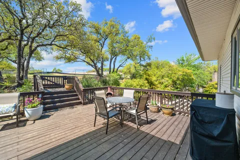 a view of outdoor sitting area with furniture