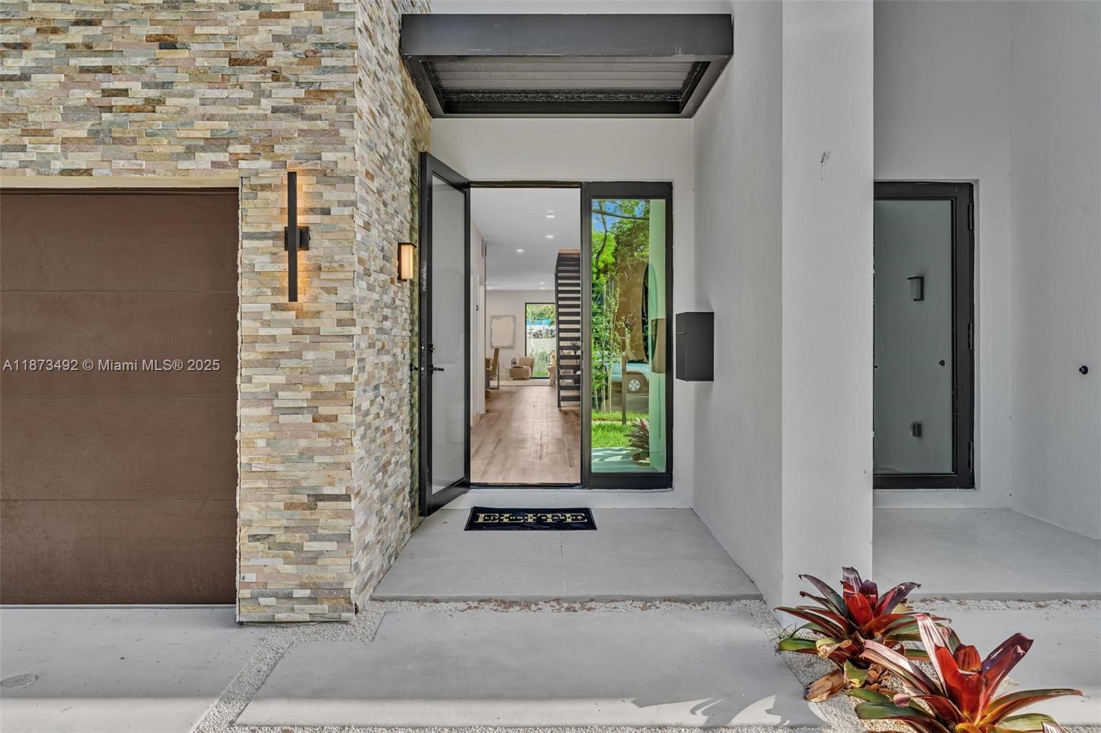 1387 Southwest 22nd Terrace Miami, FL 33145 - Photo 3 of 59 a view of a entryway door front of house