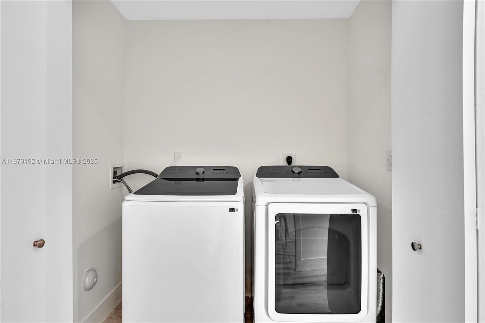 1387 Southwest 22nd Terrace Miami, FL 33145 - Photo 45 of 59 a utility room with dryer and washer
