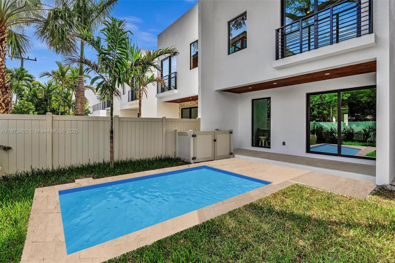1387 Southwest 22nd Terrace Miami, FL 33145 - Photo 49 of 59 a front view of a house with garden