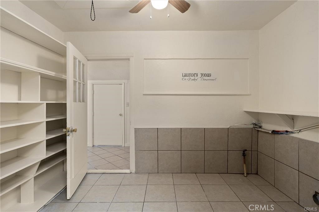 1220 Long Bar Road Oroville, CA 95966 - Photo 21 of 30 a view of a refrigerator and cabinets in it