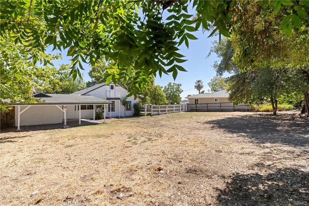 1220 Long Bar Road Oroville, CA 95966 - Photo 25 of 30 a house with a tree in front of it