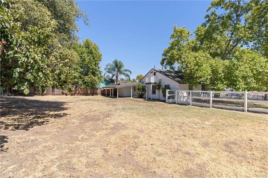 1220 Long Bar Road Oroville, CA 95966 - Photo 26 of 30 a house with trees in the background