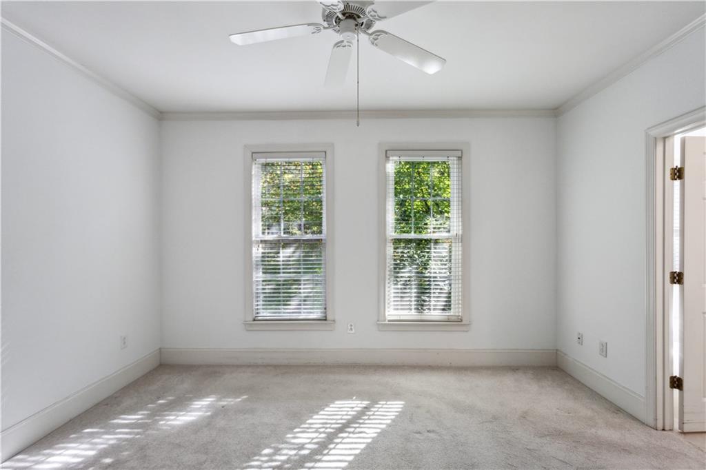 4100 Paces Walk Southeast, Unit 3205 Atlanta, GA 30339 - Photo 11 of 17 a view of an empty room with a window