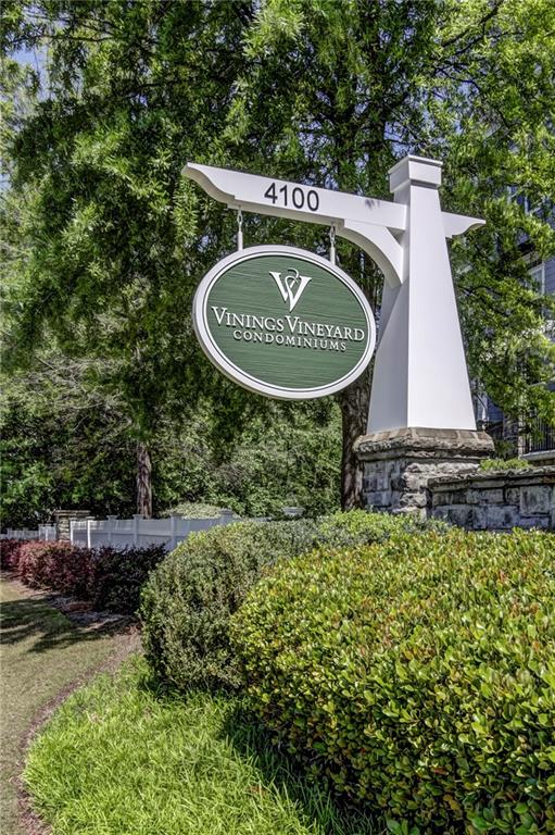 4100 Paces Walk Southeast, Unit 3205 Atlanta, GA 30339 - Photo 2 of 17 a table with a small pool