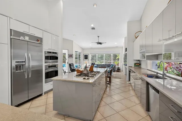 a living room with lots of furniture and appliances
