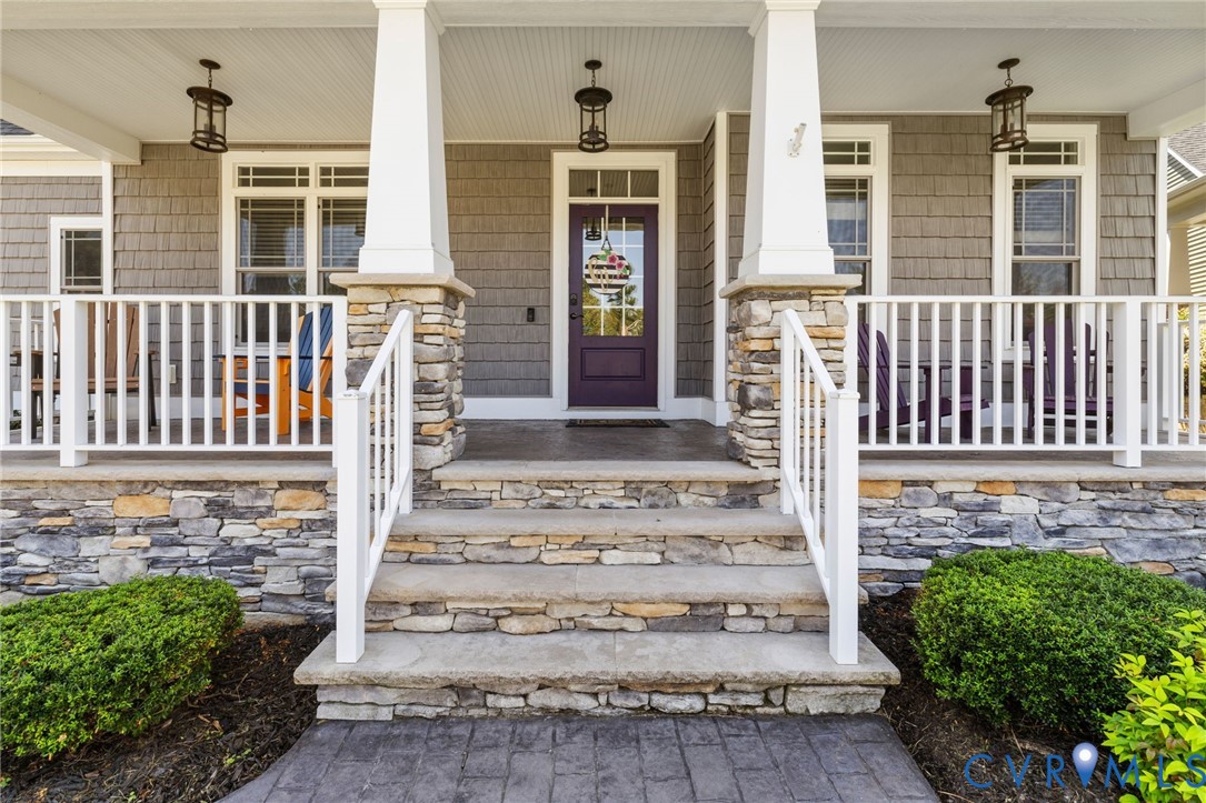 3230 Canford Loop Midlothian, VA 23112 - Photo 3 of 41 a front view of a house with a garden