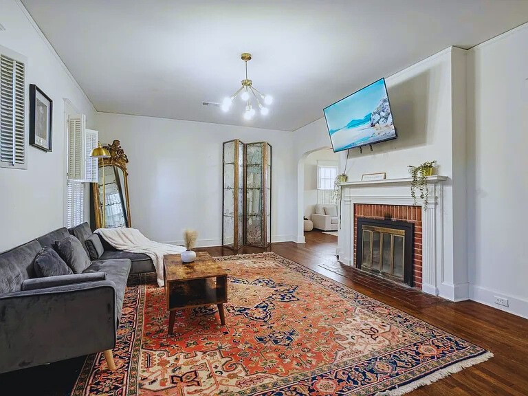 816 Charles Place Memphis, TN 38112 - Photo 13 of 24 a living room with furniture and a fireplace