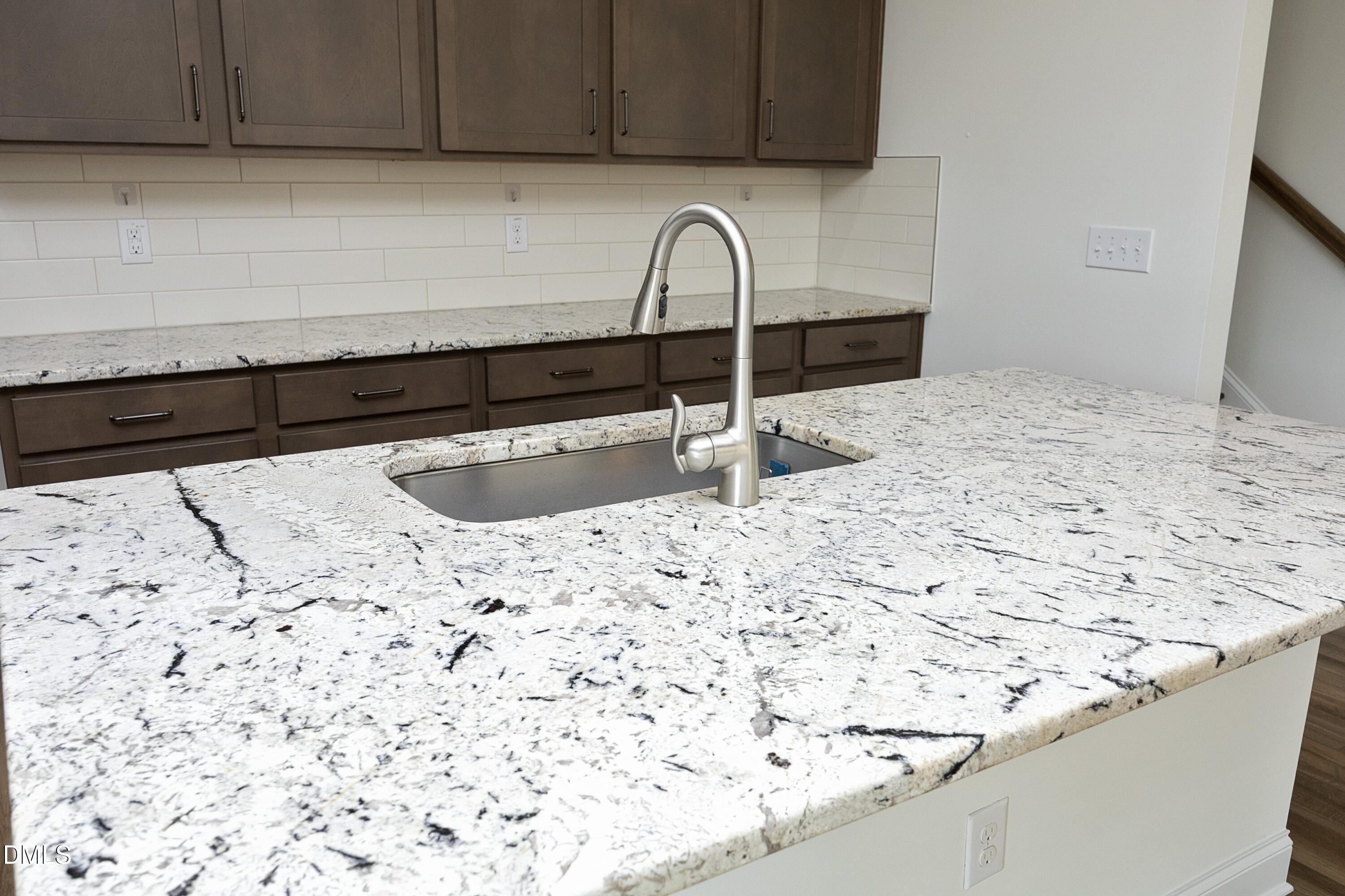 824 Country Downs Road Wake Forest, NC 27587 - Photo 15 of 41 a close view of sink and tap