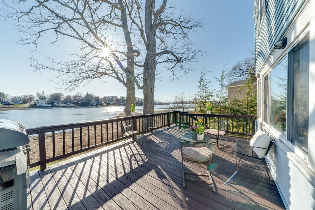 53 Colonial Road Weymouth, MA 02191 - Photo 1 of 19 a view of balcony with furniture and wooden floor