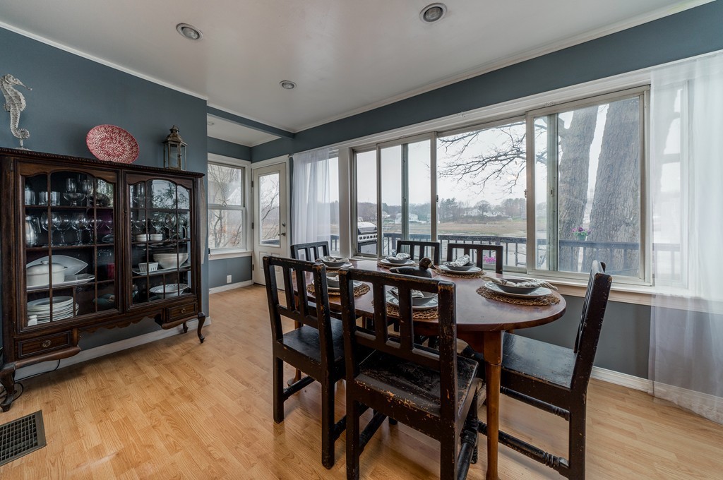 53 Colonial Road Weymouth, MA 02191 - Photo 11 of 19 a view of a dining room with furniture and window