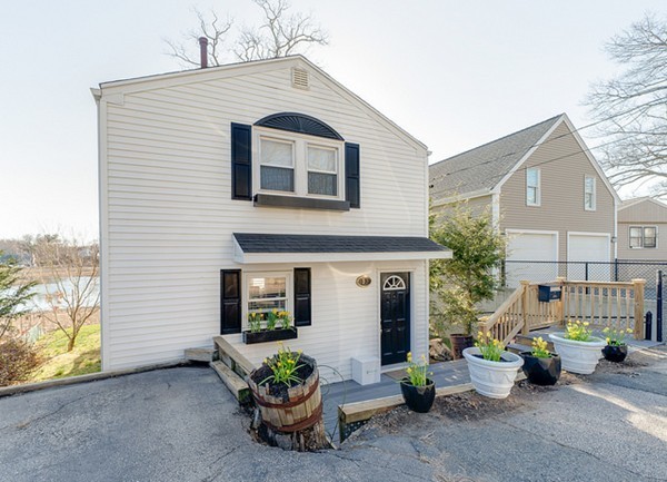 53 Colonial Road Weymouth, MA 02191 - Photo 2 of 19 a view of a patio with furniture and plants