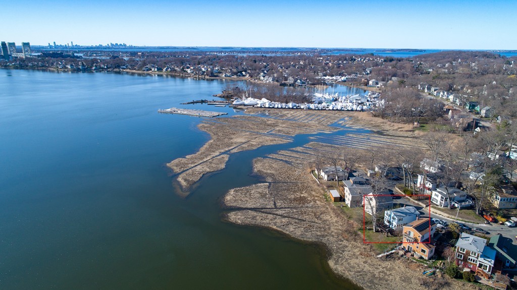 53 Colonial Road Weymouth, MA 02191 - Photo 3 of 19 an aerial view of a city with ocean view