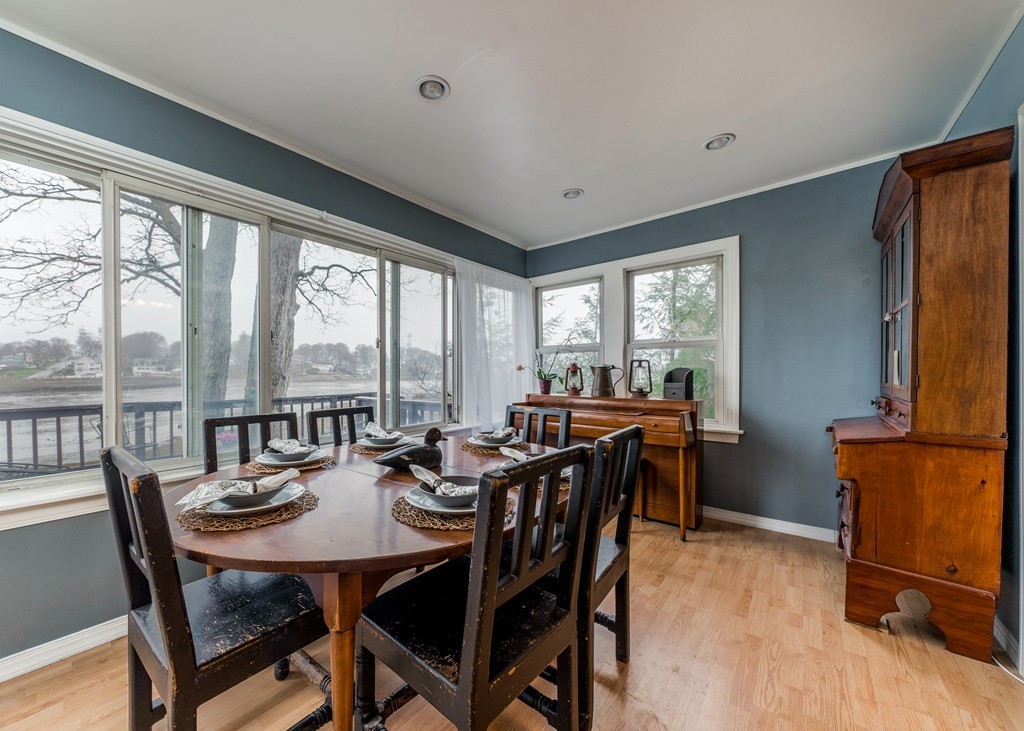 53 Colonial Road Weymouth, MA 02191 - Photo 10 of 19 a view of a dining room with furniture and a window