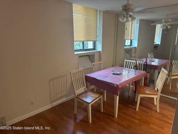 a view of kitchen and wooden floor