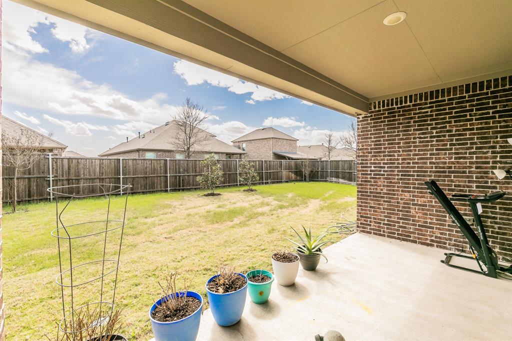 3424 Cimarron River Drive Prosper, TX 75078 - Photo 15 of 40 a view of a swimming pool with a lounge chair