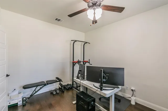 a view of a workspace with furniture