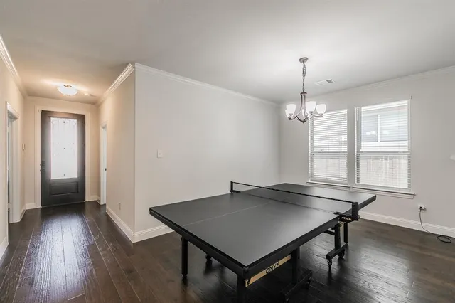 a view of a room with furniture window and wooden floor
