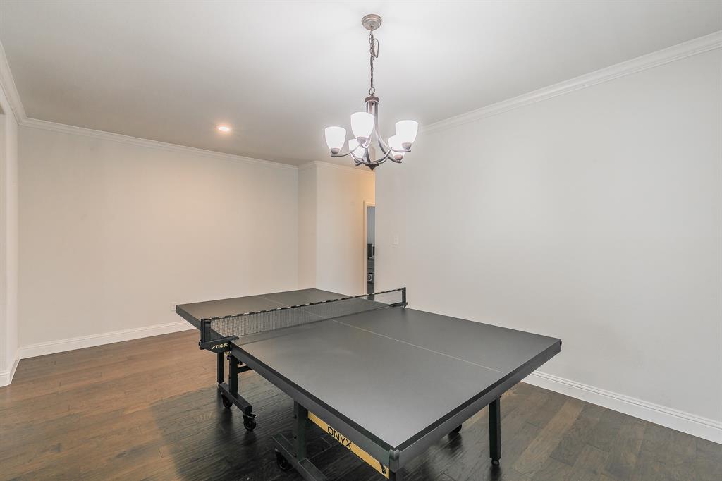 3424 Cimarron River Drive Prosper, TX 75078 - Photo 36 of 40 a view of a room with a table and chairs