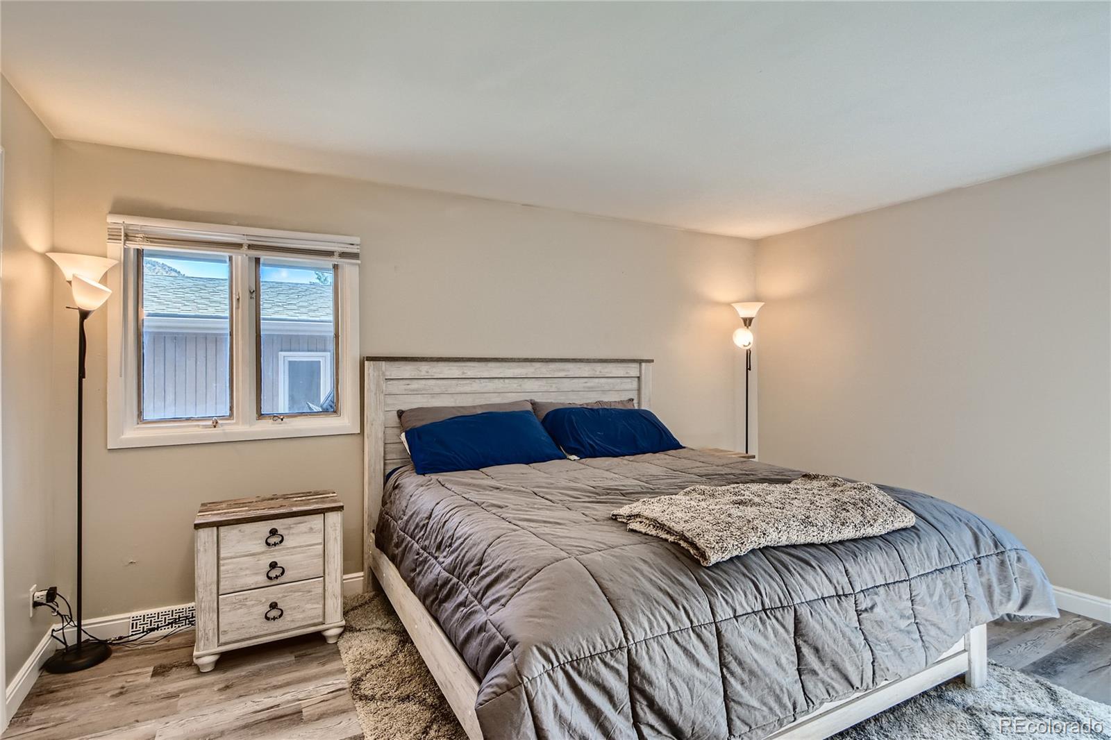 1500 Buckeye Circle Georgetown, CO 80444 - Photo 12 of 33 a bedroom with a bed and window