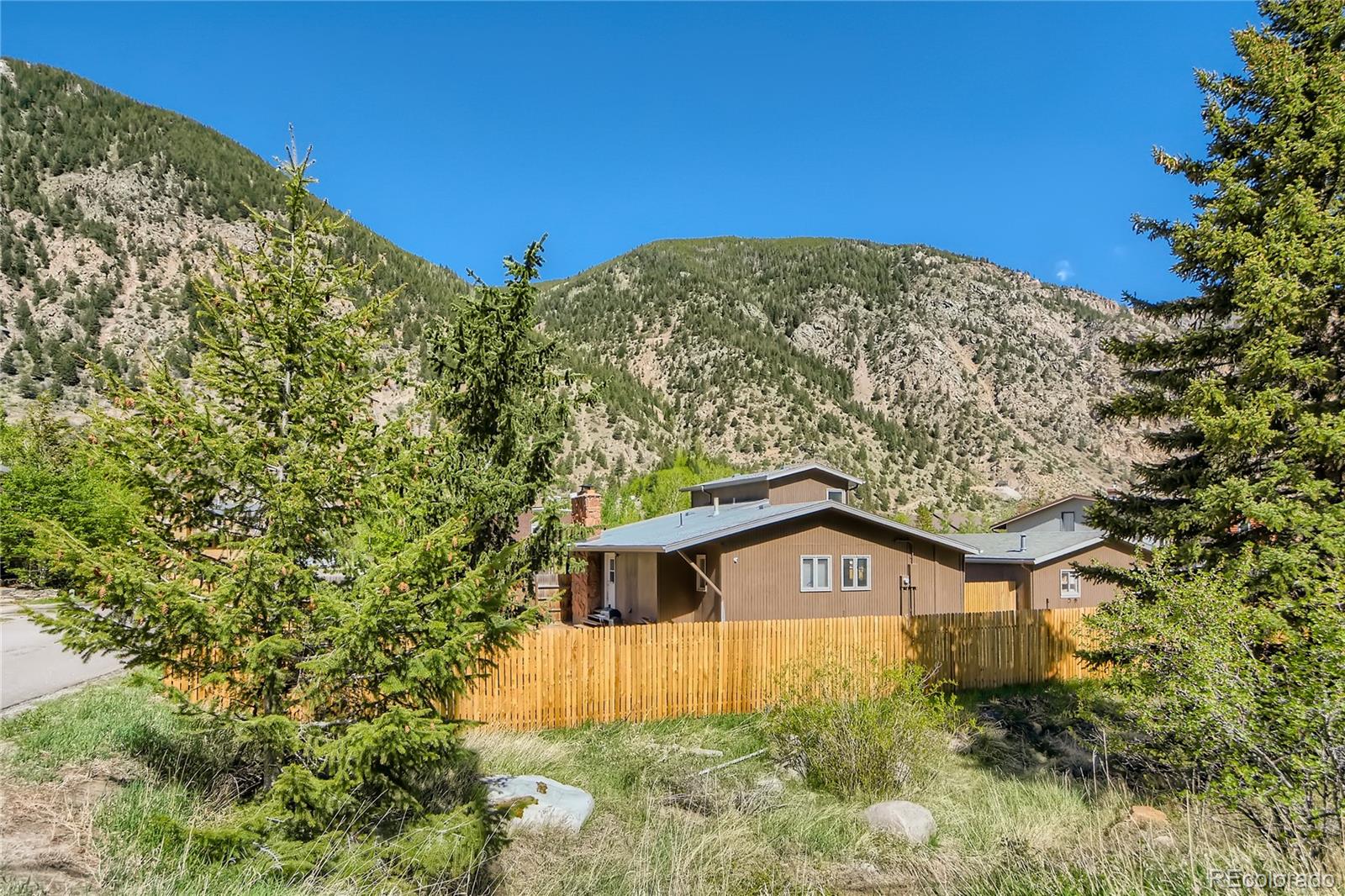 1500 Buckeye Circle Georgetown, CO 80444 - Photo 25 of 33 a house with trees in the background