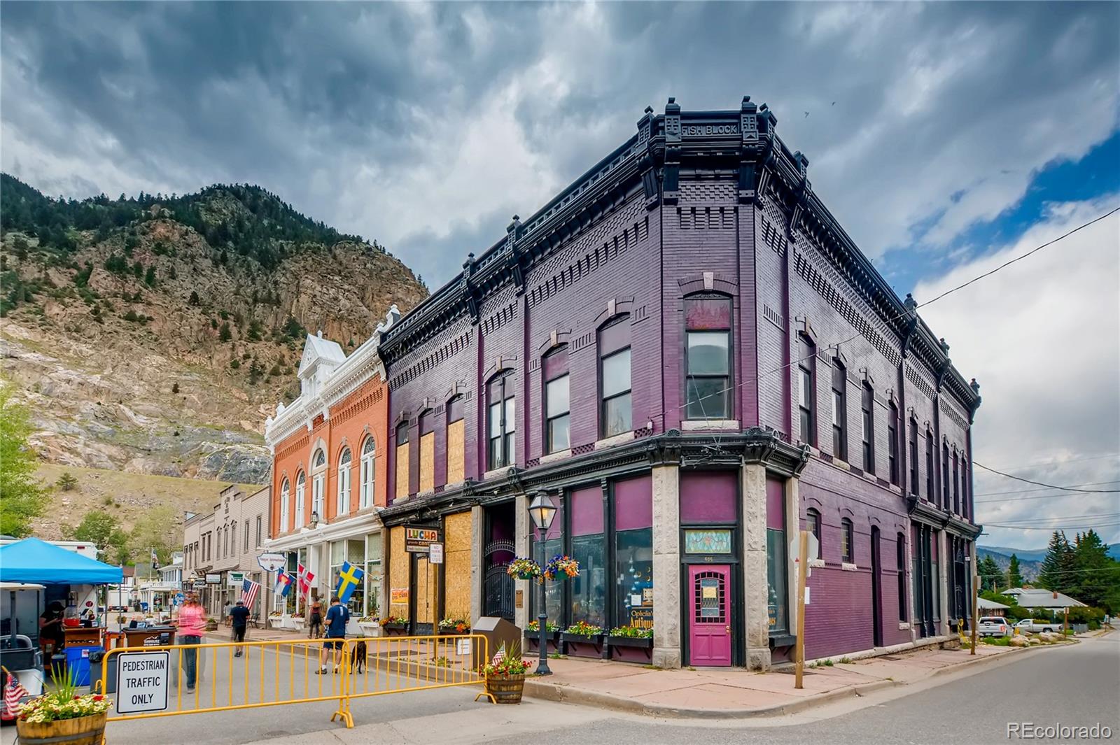 1500 Buckeye Circle Georgetown, CO 80444 - Photo 32 of 33 a front view of multi story residential apartment building with garage and traffic signal